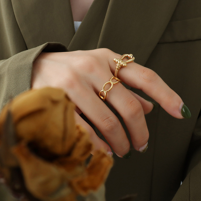 West Coast Hiphop Twisted Hollow Open Titanium Steel Ring Electroplated 18K Gold Unisex Jewelry Wholesale - Image 2